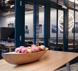 Table with apples at the lobby